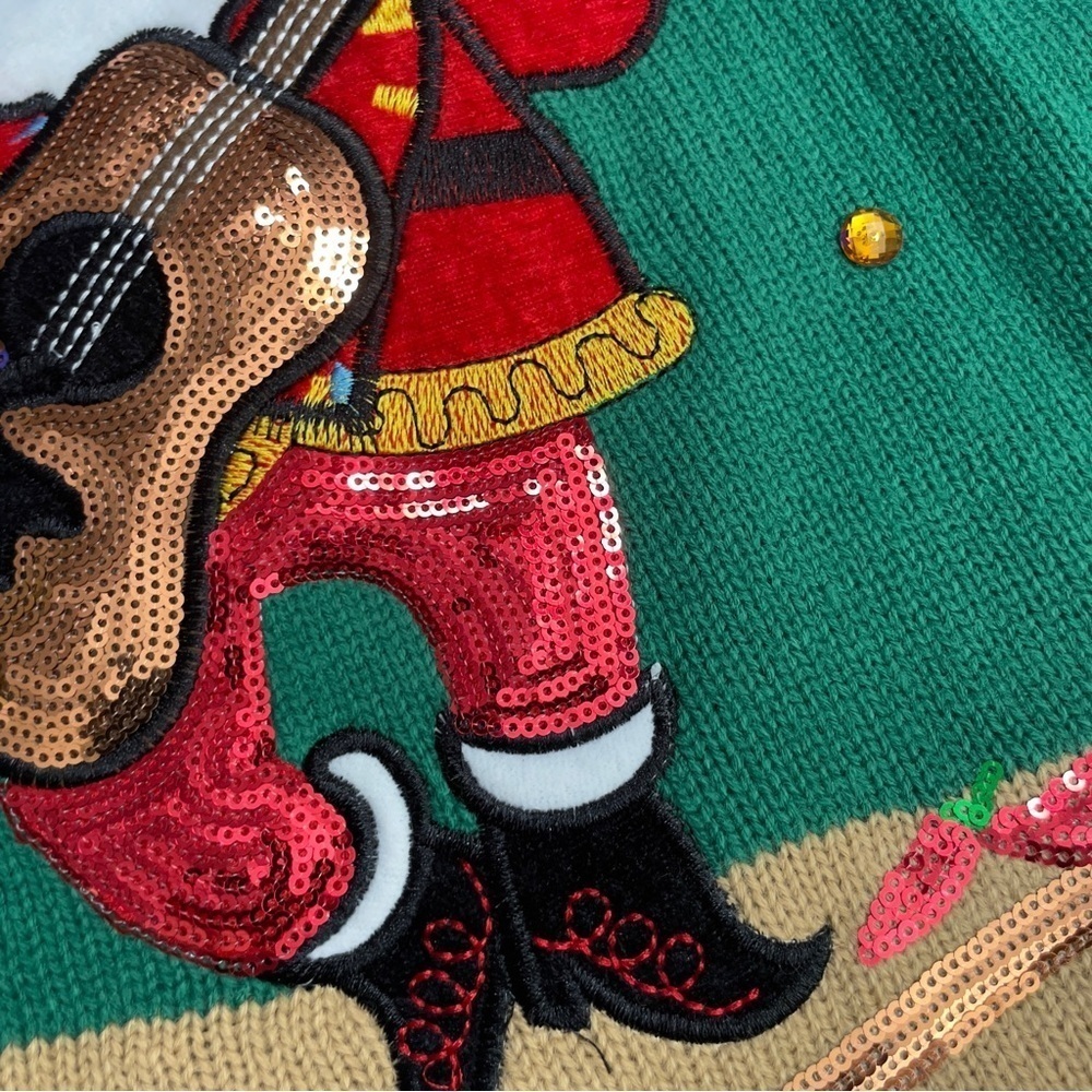 Holiday Time Feliz Navidad
Santa Sombrero Guitar Boots
Green Christmas Sweater - Picture 9 of 14